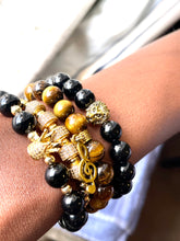 Load image into Gallery viewer, Tiger Eye's with Gold crown